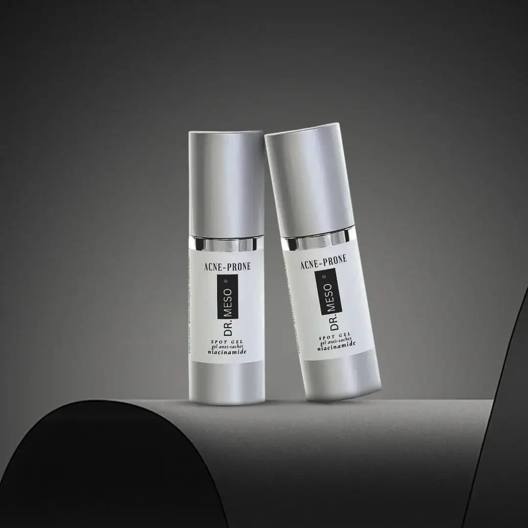 Multiple bottles of retinol serum for acne-prone skin with droppers.