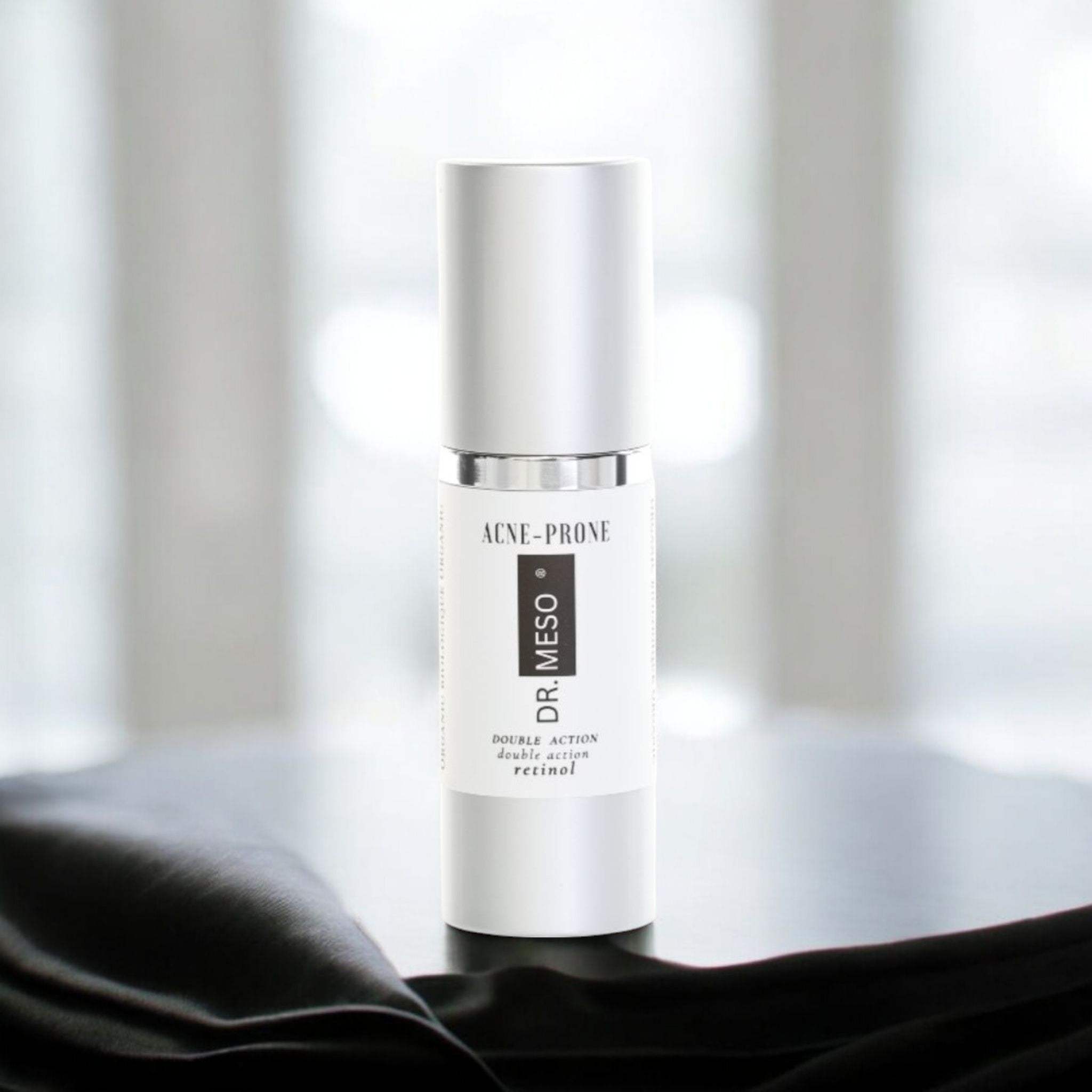 Retinol serum for acne treatment in a dropper bottle.