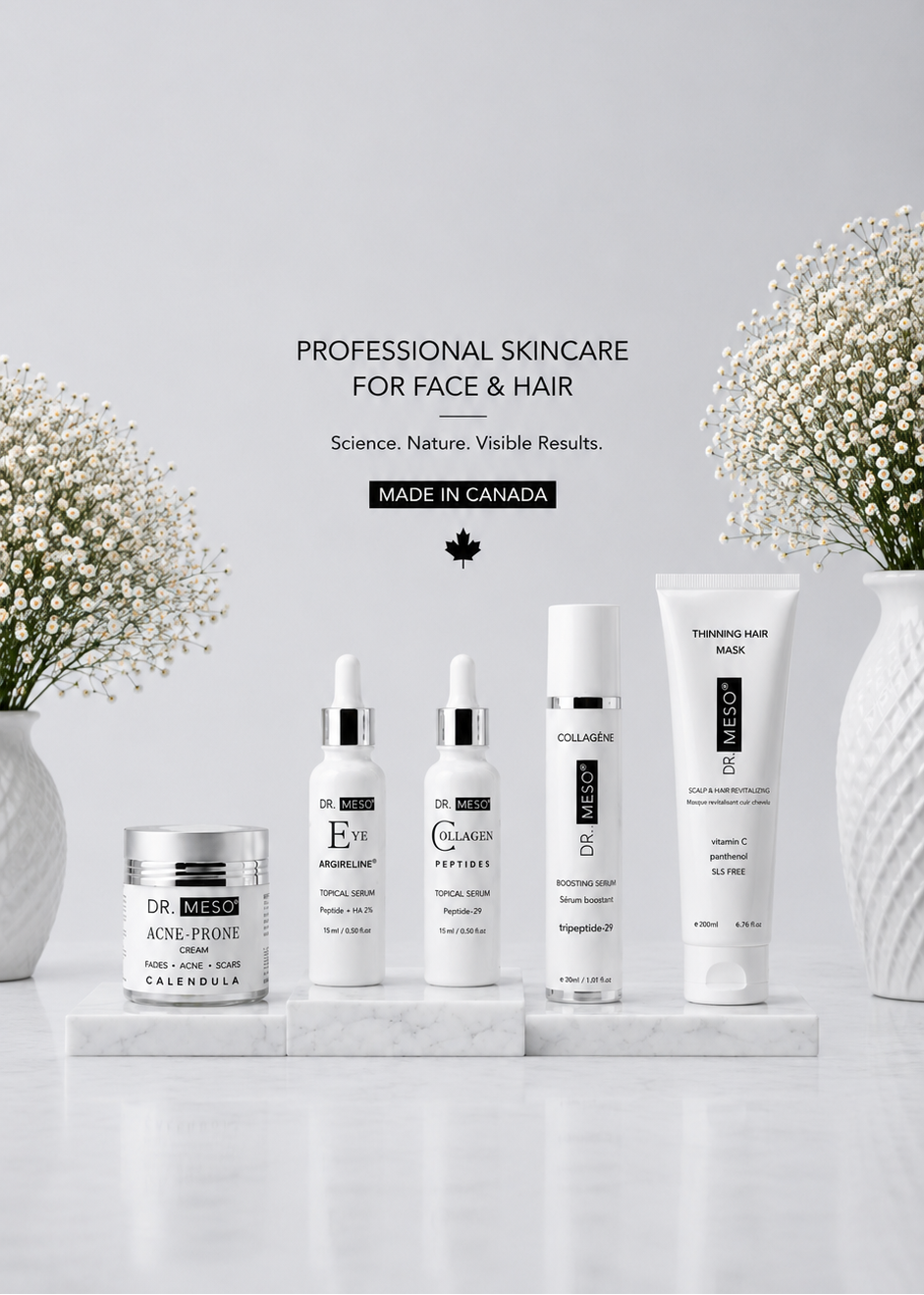 A set of five Dr. Brandt professional skincare products arranged on a white marble slab against a light gray background, flanked by white baby's breath flowers in textured vases.