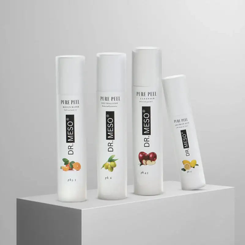 Pure Peel Kit containing exfoliating solution and skincare tools.